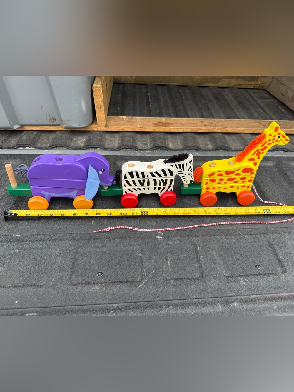 Melissa & Doug Wooden Stacking Animal Pull Toy Train (model #276).